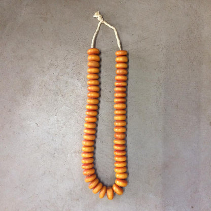AFRICAN AMBER BEAD (KENYA) LRG OVL +STAND